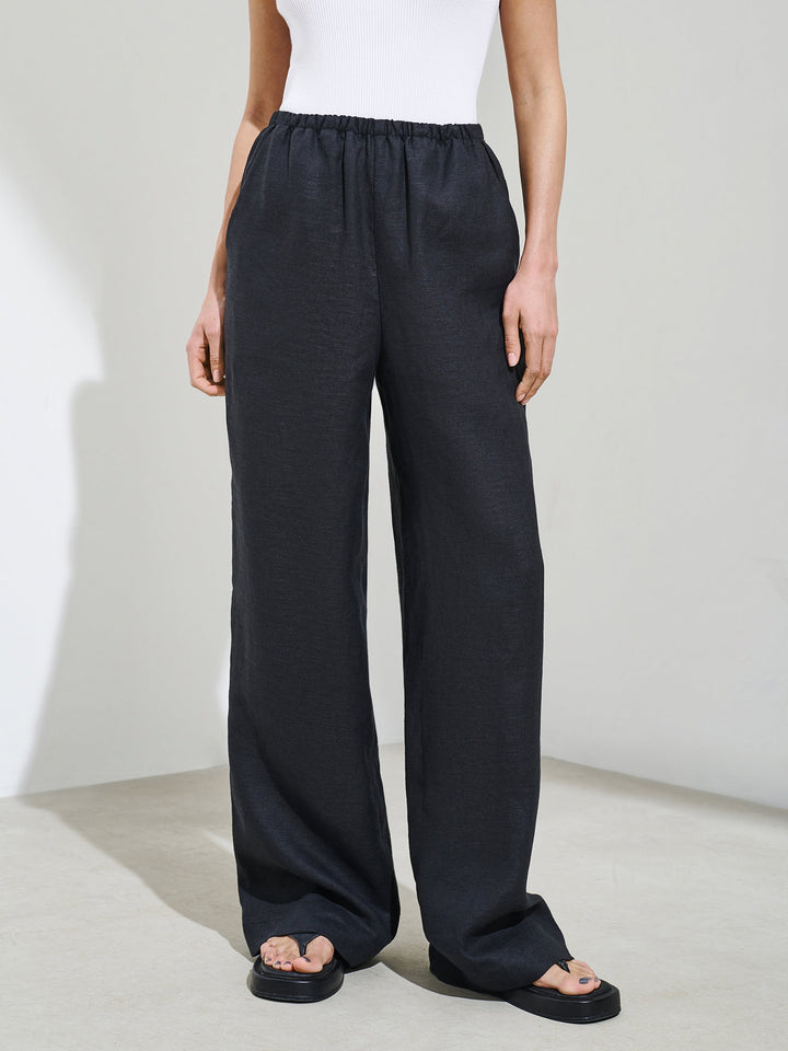 Elasticated-waist wide-leg linen pants (black)