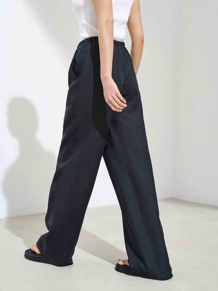 Elasticated-waist wide-leg linen pants (black)